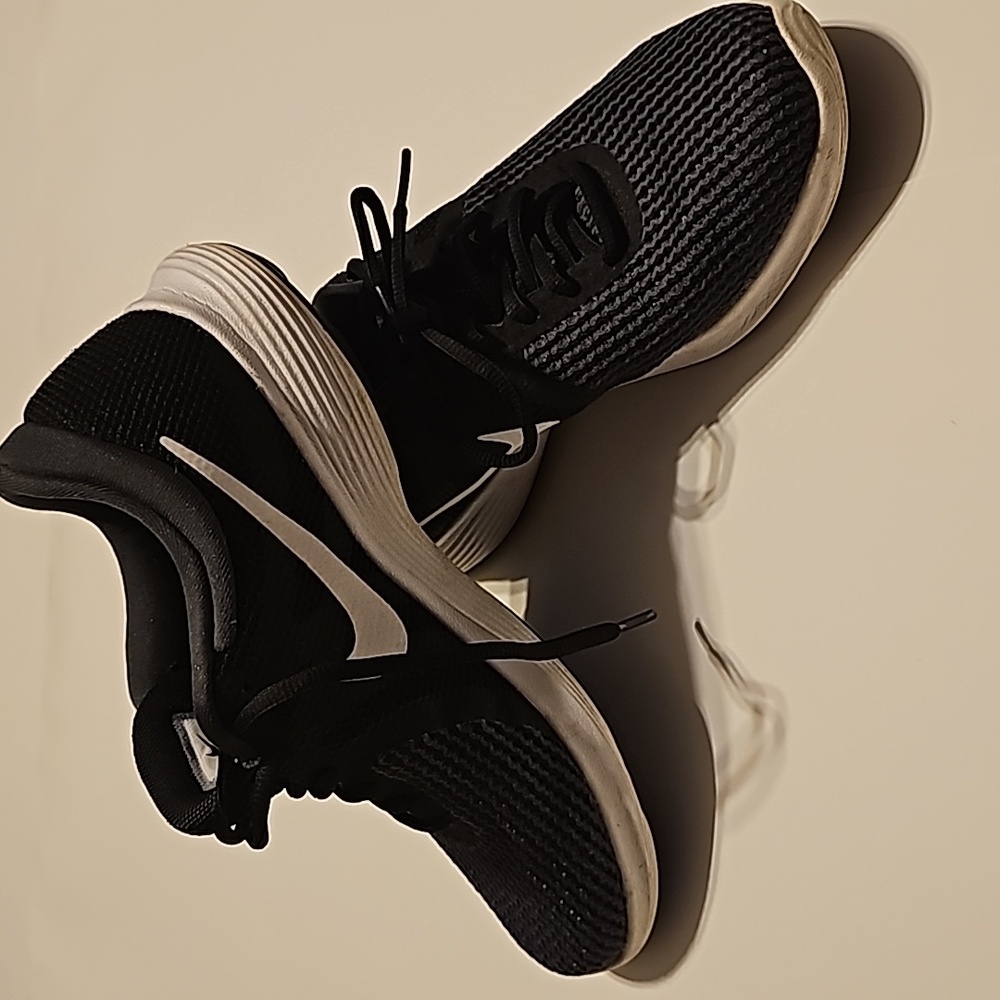 Nike Revolution 4, women size 7.5 black.
